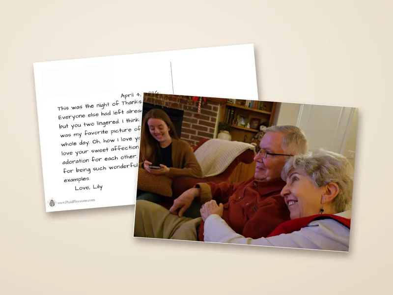 Both sides of one card: a Thanksgiving photo of a couple on the couch, and the handwritten-style message on the back